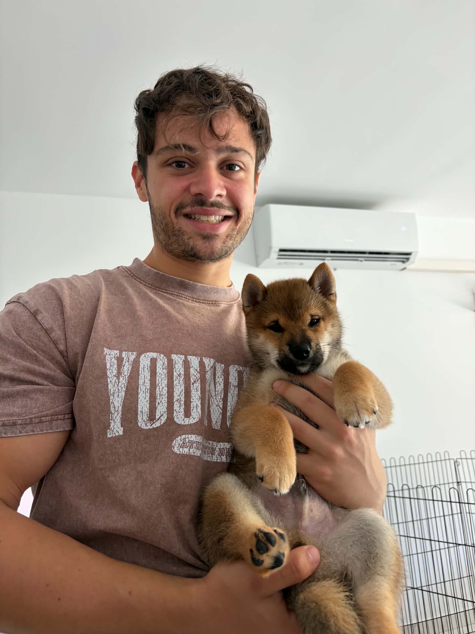 Gareth from PetBond holding a dog